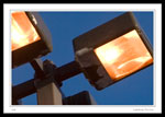 "Lighting the Day" - The lights were on in a Staples Business Depot parking lot during the day today.